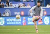 Inter Miami's Lionel Messi plays the ball during the warm up at Stade Saputo ahead of an MLS soccer game against CF Montreal in Montreal, Saturday, May 11, 2024. THE CANADIAN PRESS/Graham Hughes
