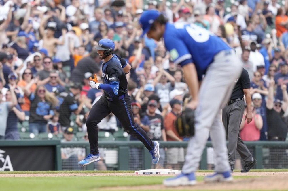 Detroit Tigers' Matt Vierling rounds the bases, as Toronto Blue Jays pitcher Jordan Romano leans over the mound after a three-run home run during the ninth inning of a baseball game, Sunday, May 26, 2024, in Detroit. (AP Photo/Carlos Osorio)
