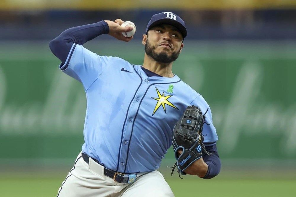 Tampa Bay Rays starting pitcher Taj Bradley throws against the Kansas City Royals during the first inning of a baseball game, Sunday, May 26, 2024, in St. Petersburg, Fla. (AP Photo/Mike Carlson)