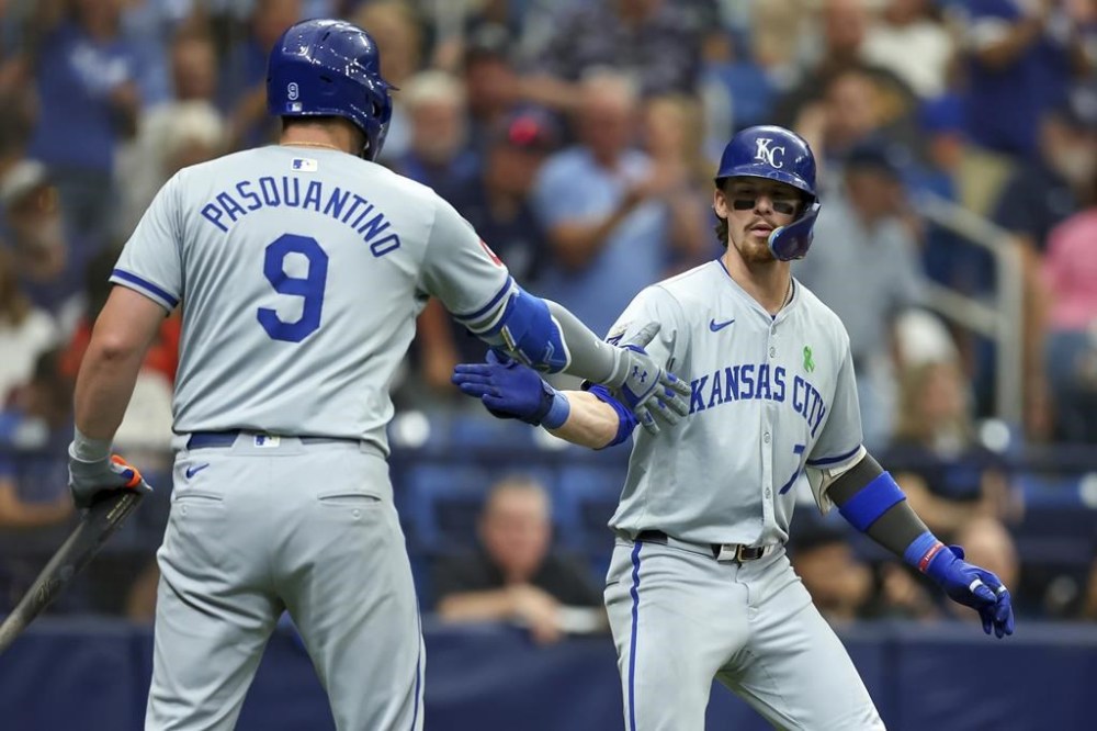 Kansas City Royals' Bobby Witt Jr., right, celebrates his home run against the Tampa Bay Rays with Vinnie Pasquantino during the sixth inning of a baseball game, Sunday, May 26, 2024, in St. Petersburg, Fla. (AP Photo/Mike Carlson)