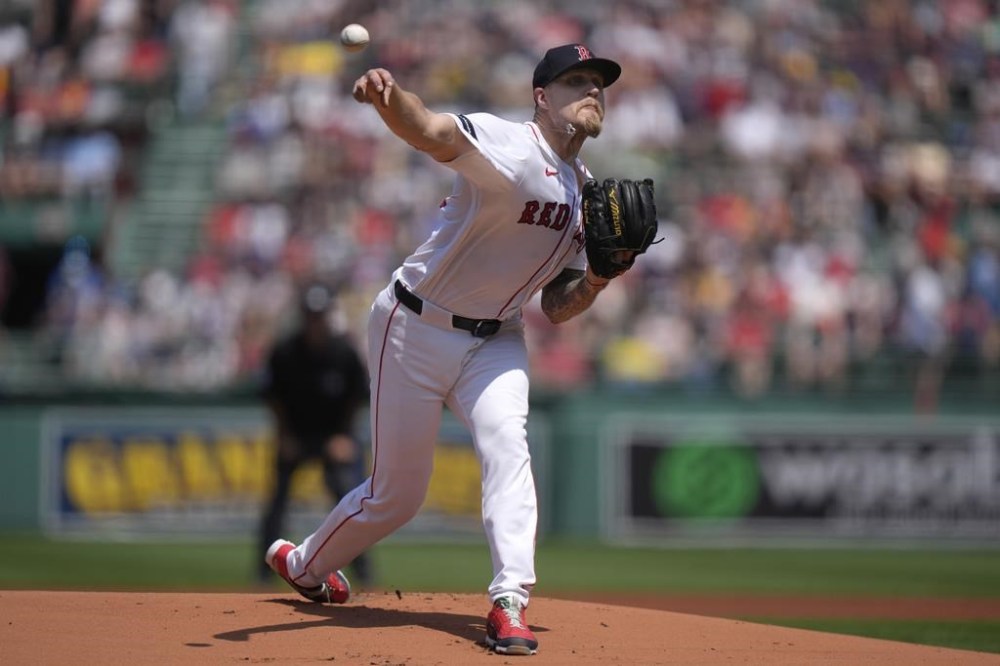 Boston Red Sox's Tanner Houck delivers a pitch to a Milwaukee Brewers batter in the first inning of a baseball game, Sunday, May 26, 2024, in Boston. (AP Photo/Steven Senne)