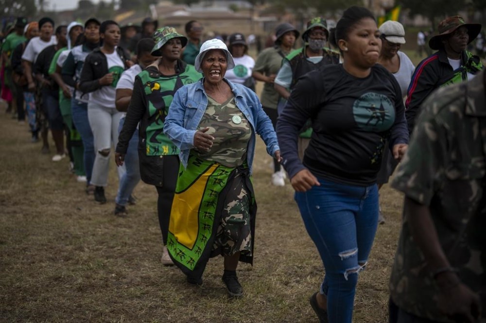 Supporters of Ukhonto weSizwe party arrive singing to attend an election meeting in Mpumalanga, near Durban, South Africa, Saturday, May 25, 2024, ahead of the 2024 general elections scheduled for May 29. (AP Photo/Emilio Morenatti)