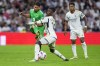 Real Madrid's Eduardo Camavinga, right, fights for the ball with Betis' Ayoze Perez during a Spanish La Liga soccer match between Real Madrid and Betis at the Santiago Bernabeu stadium in Madrid, Spain, Saturday, May 25, 2024. (AP Photo/Manu Fernandez)