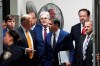 Former President Donald Trump speaks with his attorney Todd Blanche during in his trial, Tuesday, May 21, 2024, in Manhattan Criminal Court in New York. Looking on, from left are. U.S. Rep. Dale Strong, R-Ala. Texas Lt. Gov. Dan Patrick, radio host Sebastian Gorka and U.S. Rep. Troy Nehls, R-Texas. (Curtis Means/Dailymail.com via AP, Pool)