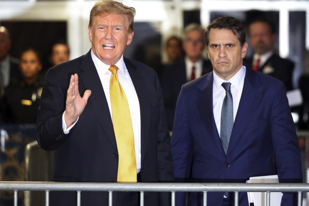Former President Donald Trump speaks alongside his attorney Todd Blanche following the day's proceedings in his trial Tuesday, May 21, 2024, in Manhattan Criminal Court in New York. (Michael M. Santiago/Pool Photo via AP)