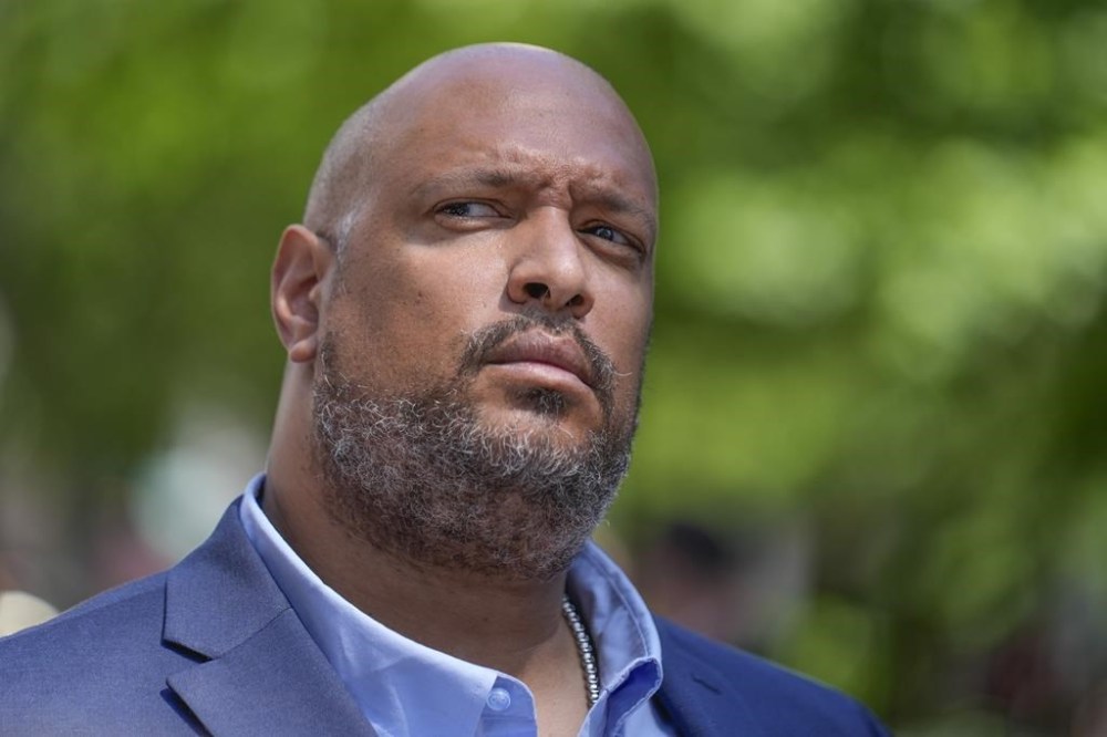 Former Capitol police officer Harry Dunn speaks to reporters in support of President Joe Biden across the street from former President Donald Trump's criminal trial in New York, Tuesday, May 28, 2024. (AP Photo/Seth Wenig)