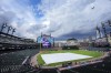 A tarp covers the infield at Comerica Park, where the baseball game between the Pittsburgh Pirates and the Detroit Tigers was postponed Tuesday, May 28, 2024, in Detroit. The team are scheduled to play a doubleheader Wednesday. (AP Photo/Carlos Osorio)