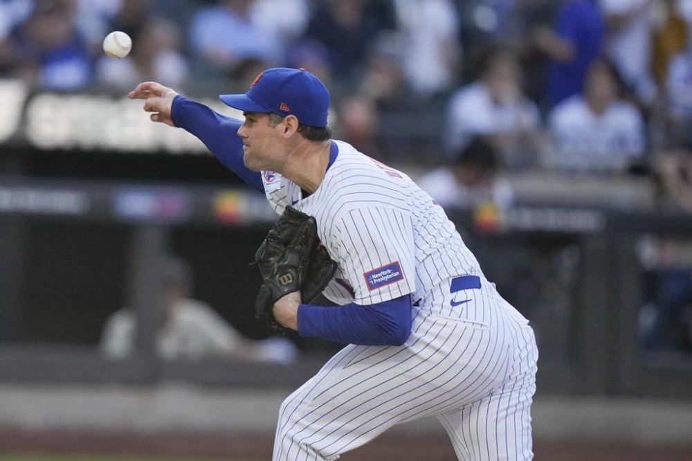 New York Mets' Adam Ottavino pitches during the ninth inning in the first baseball game of a doubleheader against the Los Angeles Dodgers Tuesday, May 28, 2024, in New York. (AP Photo/Frank Franklin II)