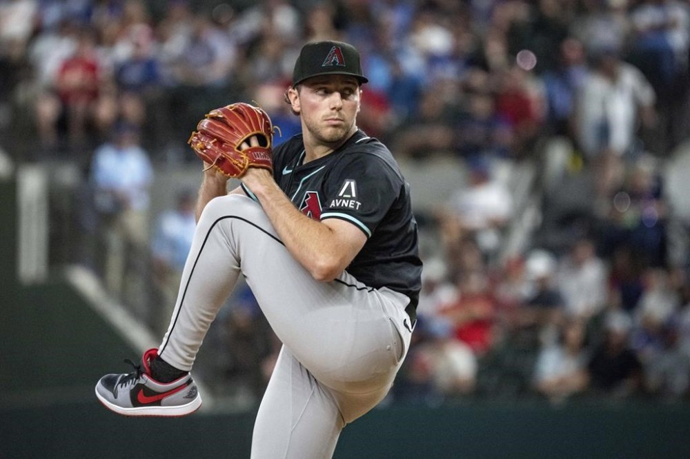 Arizona Diamondbacks starting pitcher Brandon Pfaadt works against the Texas Rangers during the first inning of a baseball game Tuesday, May 28, 2024, in Arlington, Texas. (AP Photo/Jeffrey McWhorter)