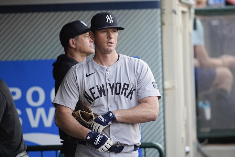 New York Yankees third baseman DJ LeMahieu stands in the dugout before the team's baseball game against the Los Angeles Angels, Tuesday, May 28, 2024, in Anaheim, Calif. (AP Photo/Ryan Sun)