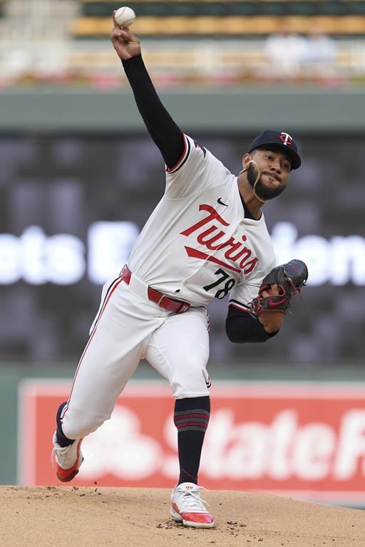Minnesota Twins starting pitcher Simeon Woods Richardson (78) delivers during the first inning of a baseball game against the Kansas City Royals, Tuesday, May 28, 2024, in Minneapolis. (AP Photo/Abbie Parr)
