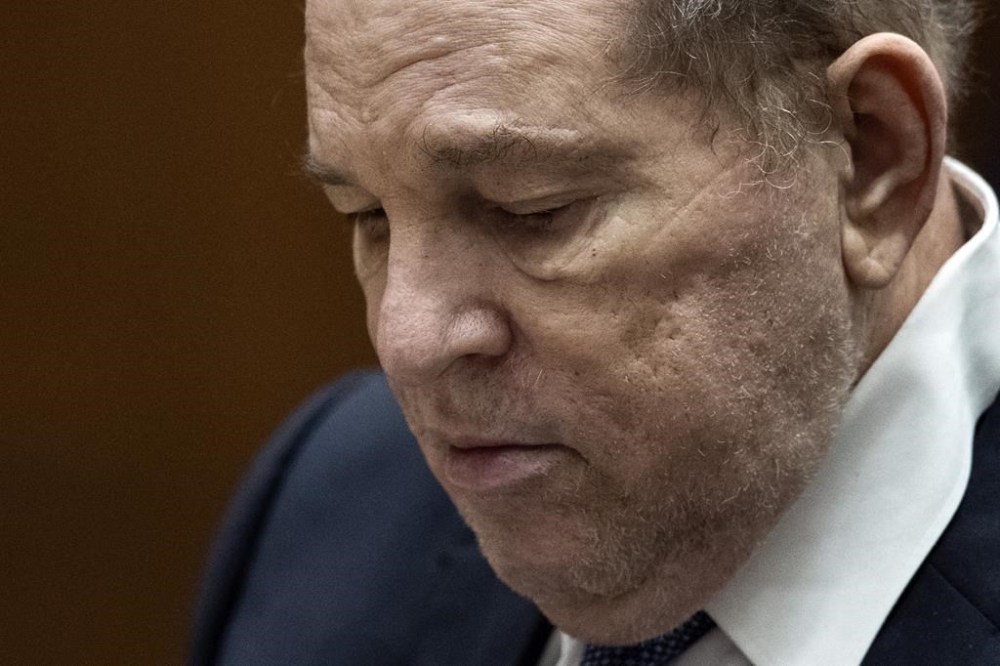 FILE - Former film producer Harvey Weinstein appears in court at the Clara Shortridge Foltz Criminal Justice Center in Los Angeles, Calif., on Oct. 4 2022. Weinstein is expected to return to a New York court as he faces a retrial of his landmark #MeToo-era rape case in a matter of months. The fallen movie mogul has a court hearing Wednesday, May 29, 2024 to address issues related to the retrial, which is slated for sometime after Labor Day. (Etienne Laurent/Pool Photo via AP, file)