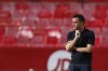 Barcelona's head coach Xavi Hernandez gestures ahead the Spanish La Liga soccer match between Sevilla and FC Barcelona at the Ramon Sanchez Pizjuan stadium in Seville, Spain, Sunday, May 26, 2024. (AP Photo/Fermin Rodriguez)