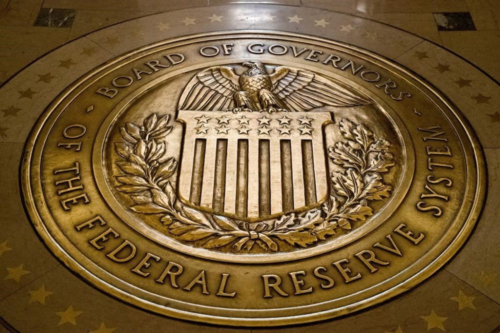 FILE- In this Feb. 5, 2018, file photo, the seal of the Board of Governors of the United States Federal Reserve System is displayed in the ground at the Marriner S. Eccles Federal Reserve Board Building in Washington. The Cleveland branch of the Federal Reserve said Wednesday, May 29, 2024, that Beth Hammack, an executive at investment bank Goldman Sachs, would be its next president effective Aug. 21. (AP Photo/Andrew Harnik, File)