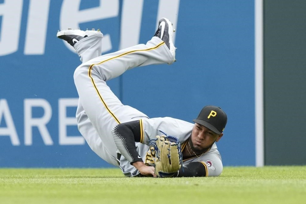 Pittsburgh Pirates right fielder Edward Olivares catches the fly out hit by Detroit Tigers' Wenceel Perez during the third inning in the first baseball game of a doubleheader, Wednesday, May 29, 2024, in Detroit. (AP Photo/Carlos Osorio)