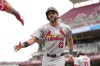 St. Louis Cardinals' Matt Carpenter (13) celebrates with teammates after hitting a solo home run during the third inning of a baseball game against the Cincinnati Reds, Wednesday, May 29, 2024, in Cincinnati. (AP Photo/Jeff Dean)
