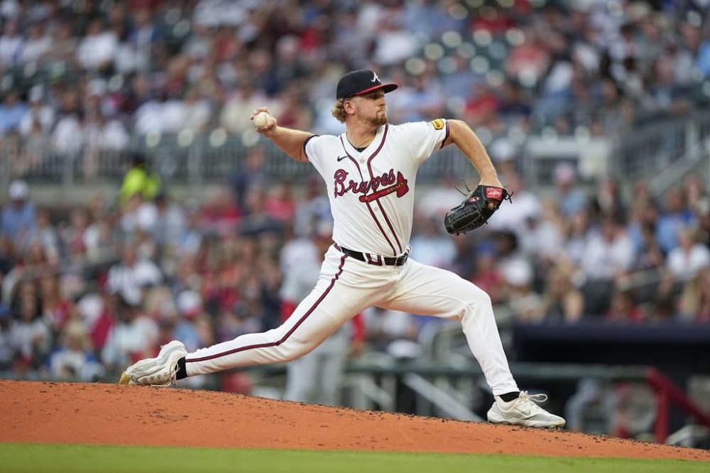 Atlanta Braves pitcher Spencer Schwellenbach (56) delivers in the third inning of a baseball game against the Washington Nationals, Wednesday, May 29, 2024, in Atlanta. (AP Photo/Brynn Anderson)