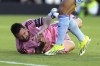 Inter Miami forward Lionel Messi falls to the pitch during the first half of the team's MLS soccer match Wednesday against Atlanta United, May 29, 2024, in Fort Lauderdale, Fla. (AP Photo/Lynne Sladky)