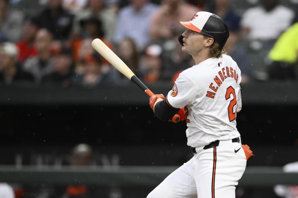 Baltimore Orioles' Gunnar Henderson watches his grand slam against the Boston Red Sox during the second inning of a baseball game Wednesday, May 29, 2024, in Baltimore. (AP Photo/Nick Wass)
