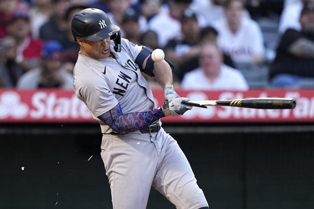 New York Yankees' Giancarlo Stanton breaks his bat as he grounds out during the third inning of a baseball game against the Los Angeles Angels Wednesday, May 29, 2024, in Anaheim, Calif. (AP Photo/Mark J. Terrill)