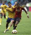 Seattle Sounders defender Nouhou Tolo dribbles the ball upfield as Real Salt Lake midfielder Nelson Palacio goes for the ball during the first half of an MLS soccer match Wednesday, May 29, 2024, in Seattle. (Nick Wagner/The Seattle Times via AP)