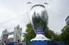A giant replica of the Champions League Trophy stands at the Champions Festival in Potters Fields Park near Tower Bridge in London, Thursday, May 30, 2024. The Champions League final between Dortmund and Real Madrid will take place at Wembley Stadium on Saturday June 1. (AP Photo/Kirsty Wigglesworth)