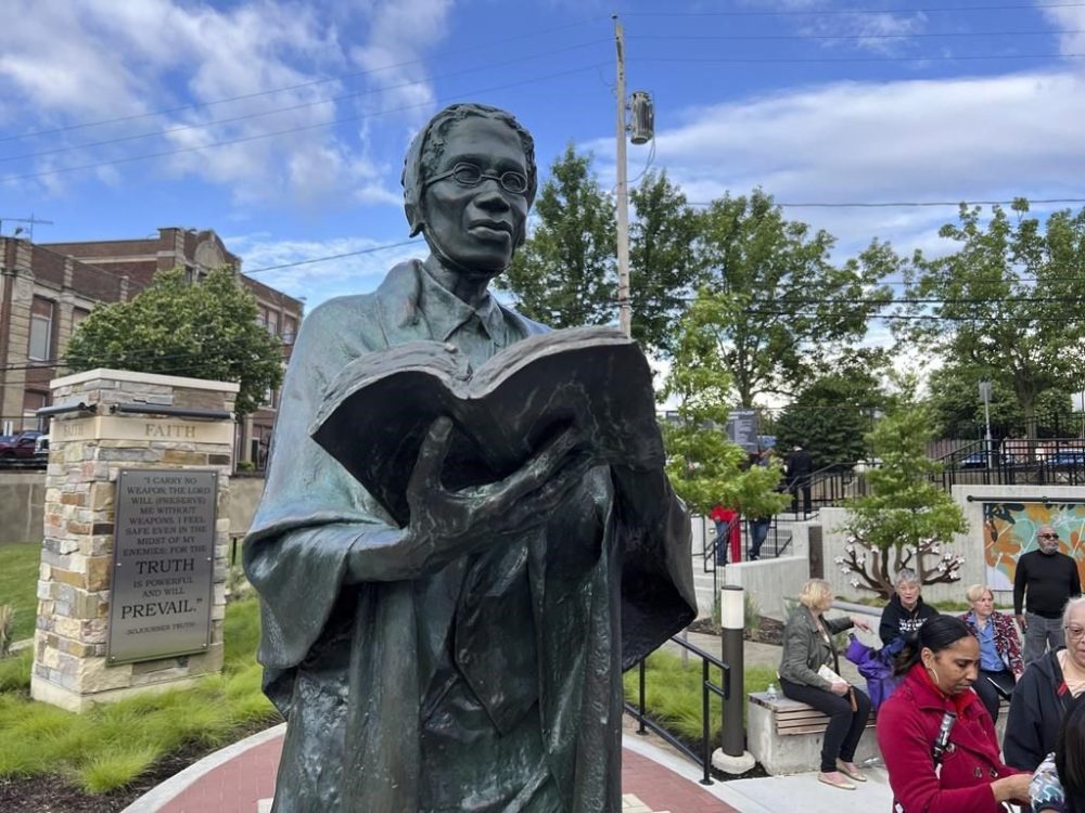 A statue of women's rights pioneer Sojourner Truth sits in the Sojourner Truth Legacy Plaza in Akron, Ohio, on Wednesday, May 29, 2024. Hundreds gathered in an Ohio city Wednesday to unveil a plaza and statue dedicated to women's rights pioneer Sojourner Truth at the very spot she gave a speech now known as