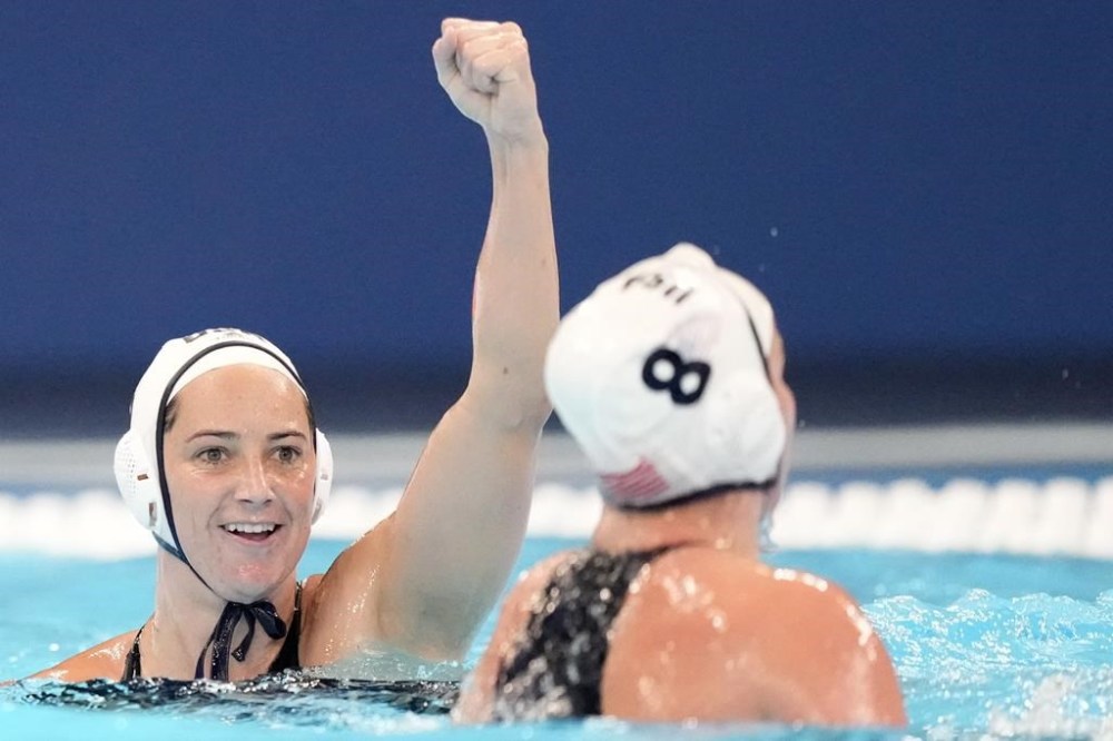 FILE - Maggie Steffens of the United States celebrates after scoring during the women's water polo final against Hungary at the World Aquatics Championships in Doha, Qatar, Friday, Feb. 16, 2024. Steffens is the highest scoring woman in Olympics history with 56 goals. (AP Photo/Lee Jin-man, File)