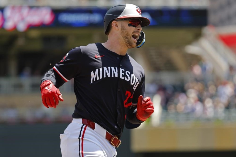 Minnesota Twins' Ryan Jeffers runs the bases on his solo home run against the Kansas City Royals in the fifth inning of a baseball game Thursday, May 30, 2024, in Minneapolis. (AP Photo/Bruce Kluckhohn)