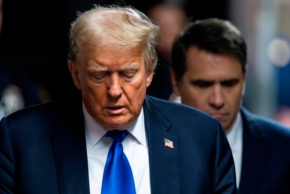 Former President Donald Trump arrives to the courthouse as the jury in his criminal trial is scheduled to continue deliberations at Manhattan Criminal Court, Thursday, May 30, 2024, in New York. (Justin Lane/Pool Photo via AP)