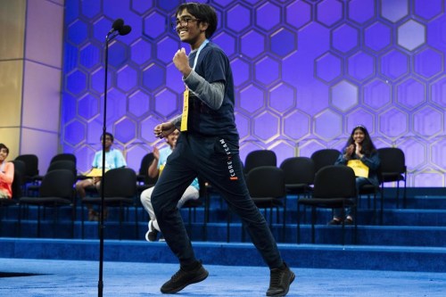 Faizan Zaki, 12, of Allen, Texas, reacts with jubilation after spelling his final word correctly during the semifinals of the Scripps National Spelling Bee, in Oxon Hill, Md., Wednesday, May 29, 2024. Eight spellers including Zaki will continue on to Thursday night's finals. (AP Photo/Jacquelyn Martin)
