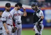 Arizona Diamondbacks pitcher Zac Gallen pauses with third baseman Eugenio Suárez, left and and catcher Gabriel Moreno, right, after an injury during the first inning of the team's baseball game against the New York Mets, Thursday, May 30, 2024, in New York. (AP Photo/Noah K. Murray)
