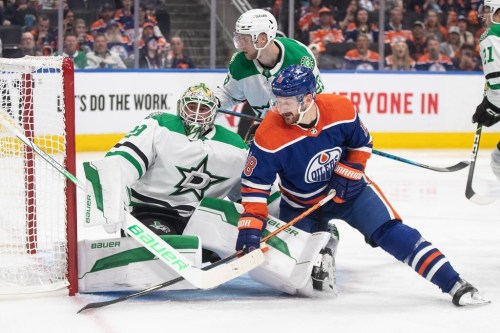 Edmonton Oilers' Zach Hyman crashes into Dallas Stars goaltender Jake Oettinger during NHL playoff action in Edmonton on Monday, May 27, 2024.THE CANADIAN PRESS/Jason Franson