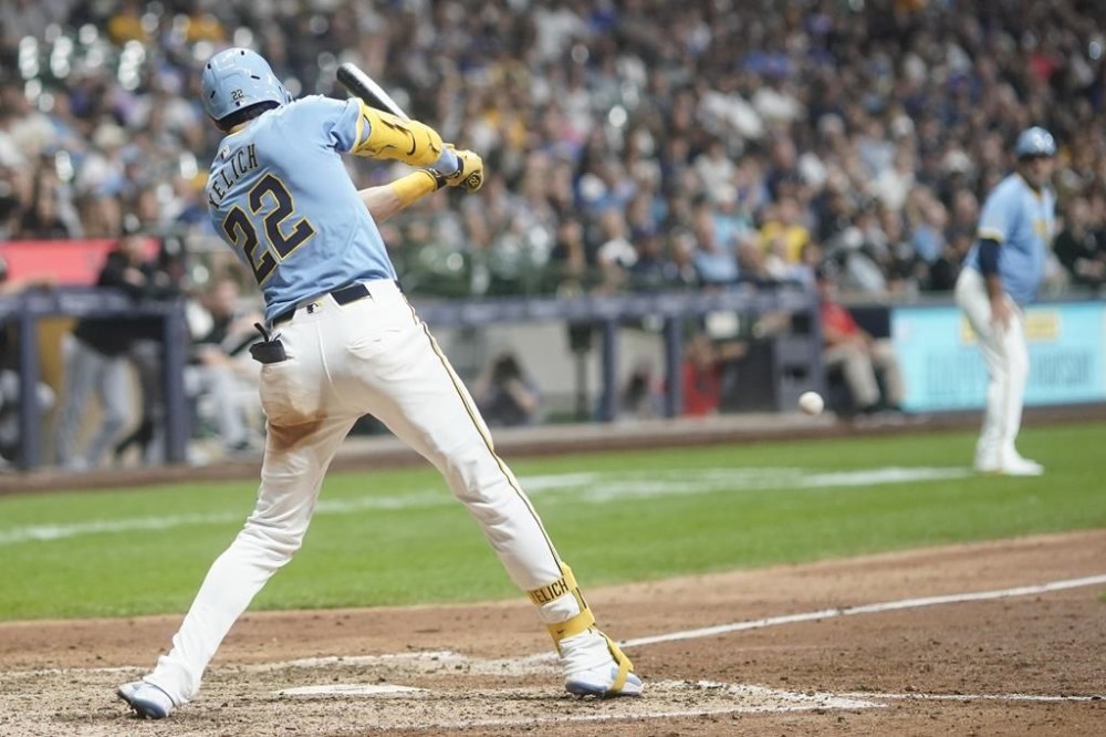 Milwaukee Brewers' Christian Yelich hits a two-run scoring double during the seventh inning of a baseball game against the Chicago White Sox Friday, May 31, 2024, in Milwaukee. The double was Yelich's 300th career double. (AP Photo/Morry Gash)
