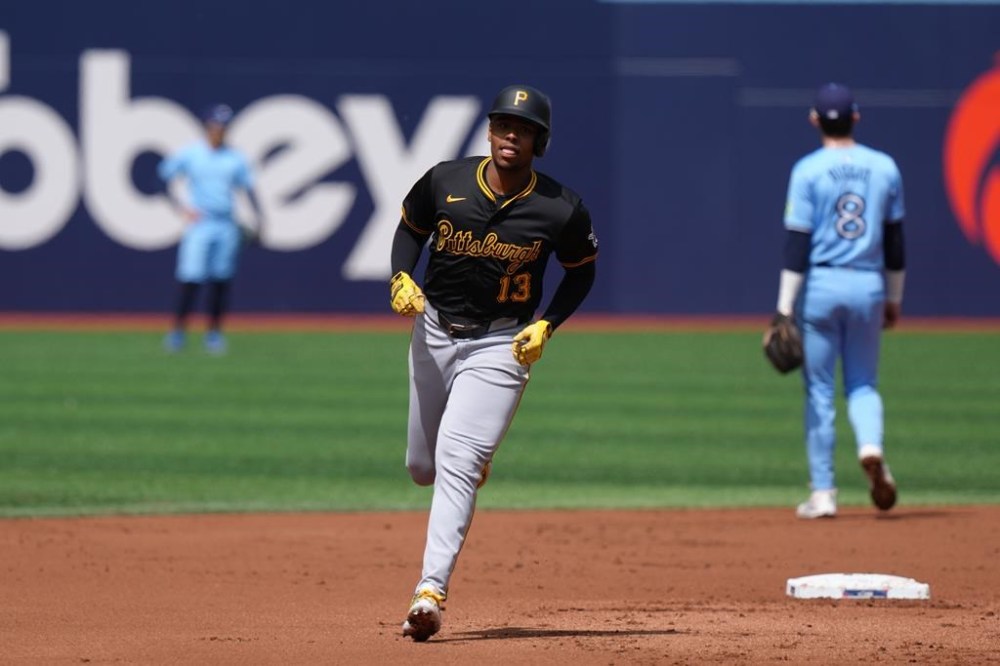 Pittsburgh Pirates third base Ke'Bryan Hayes (13) rounds the bases after hitting a two run home run against Toronto Blue Jays pitcher Yusei Kikuchi during first inning interleague MLB baseball action in Toronto on Saturday, June 1, 2024. THE CANADIAN PRESS/Chris Young