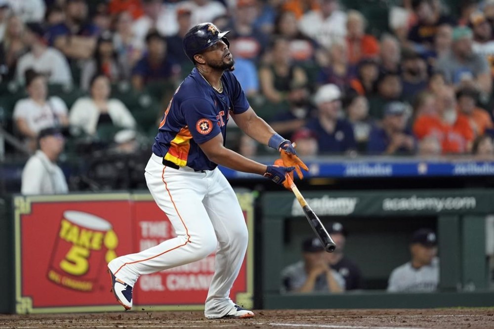 Houston Astros' José Abreu watches his home run against the Minnesota Twins during the second inning of a baseball game Saturday, June 1, 2024, in Houston. (AP Photo/David J. Phillip)
