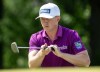 Mackenzie Hughes, of Dundas, Ontario lines up his putt on the 2nd hole in the 3rd round of the Canadian Open in Hamilton on Saturday June 1, 2024. THE CANADIAN PRESS/Frank Gunn