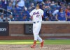 New York Mets' Mark Vientos (27) reacts after hitting a home run against the Arizona Diamondbacks in the fifth inning of a baseball game, Saturday, June 1, 2024, in New York. (AP Photo/Noah K. Murray)