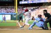 Philadelphia Phillies' Bryce Harper hits a single off St. Louis Cardinals' Sonny Gray during the first inning of a baseball game Saturday, June 1, 2024, in Philadelphia. (AP Photo/Derik Hamilton)
