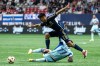 Vancouver Whitecaps' Mathias Laborda (2) vies for the ball as he jumps over Colorado Rapids' Darren Yapi (77) during the first half of an MLS soccer match in Vancouver, on Saturday, June 1, 2024. THE CANADIAN PRESS/Ethan Cairns