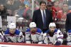 New York Rangers head coach Peter Laviolette, top, watches the third period of Game 6 in the Eastern Conference finals against the Florida Panthers of the NHL hockey Stanley Cup playoffs Saturday, June 1, 2024, in Sunrise, Fla. (AP Photo/Lynne Sladky)