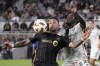 Los Angeles FC forward Cristian Olivera, left, and FC Dallas midfielder Ema Twumasi battle for the ball during the first half of a Major League Soccer match Saturday, June 1, 2024, in Los Angeles. (AP Photo/Mark J. Terrill)