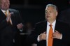 FILE - Hungary's Prime Minister Viktor Orban acknowledges cheering supporters during an election night rally in Budapest, Hungary, Sunday, April 3, 2022. As former U.S. President Donald Trump attacked the U.S. criminal justice system following his guilty verdict, analysts say that his allegations could be useful to Russian President Vladimir Putin and other autocrats. (AP Photo/Petr David Josek, File)