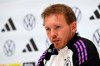 Germany's head coach Julian Nagelsmann attends a press conference of the German national soccer team in Herzogenaurach, Germany, Sunday, June 2, 2024, ahead of the European Championship test match between Germany and Ukraine on Monday, June 3. Nagelsmann says he was shocked by a public broadcaster’s survey that asked participants if they would prefer more white players on his team. (Federico Gambarini/dpa via AP)