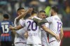 Fiorentina's Andrea Belotti, center, celebrates with teammates scoring their side's first goal of the game during the Italian Serie A soccer match between Atalanta and Fiorentina at the Gewiss Stadium, in Bergamo, Italy, Sunday June 2, 2024. (Spada/LaPresse via AP)