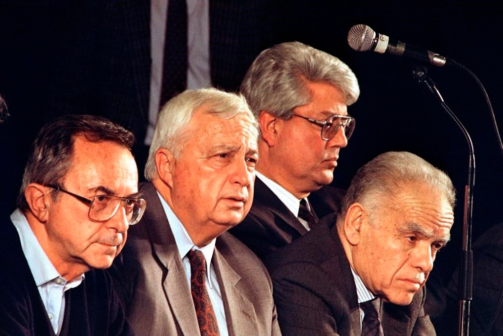 FILE - Leaders of Israeli Likud ruling party, left to right, Defense Minister Moshe Arens, Housing Minister Ariel Sharon, Foreign Minister David Levy and Prime Minister Yitzhak Shamir attend a Likud Party convention, Feb. 10, 1992, in Tel Aviv, Israel. Levy, an Israeli politician born in Morocco who fought tirelessly against deep-seated racism against Jews from North Africa and went on to serve as foreign minister and hold other senior governmental posts, died Sunday, June 2, 2024. He was 86. (AP Photo/Nati Harnik, File)