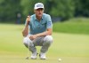 Mackenzie Hughes, of Dundas, Ont., lines up his putt on the 2nd hole in the final round of the Canadian Open in Hamilton, Ont., Sunday, June 2, 2024. THE CANADIAN PRESS/Frank Gunn
