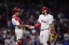 Philadelphia Phillies' Bryce Harper, right, and J.T. Realmuto, left, celebrate after a baseball game against the St. Louis Cardinals, Saturday, June 1, 2024, in Philadelphia. (AP Photo/Derik Hamilton)