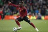 FILE - Belgium's Jeremy Doku controls the ball during the international friendly soccer match between Ireland and Belgium in Dublin, Ireland, Saturday, March 23, 2024. For all its talent, Belgium's so-called golden generation of soccer players has never won a major title. With only a few members of that era still around, a new group of ambitious youngsters chaperoned by seasoned veterans will compete at the European Championship, looking to shed the country's underachiever reputation. (AP Photo/Peter Morrison, File)