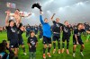 Bochum players celebrate after winning a Bundesliga soccer match against Fortuna Duesseldorf in Duesseldorf, Germany, Monday, May 27, 2024. (Marius Becker/dpa via AP)